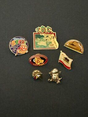 Lot Of 7 Vintage Collectible Pins Florida Orange Bowl Hogs Breath California